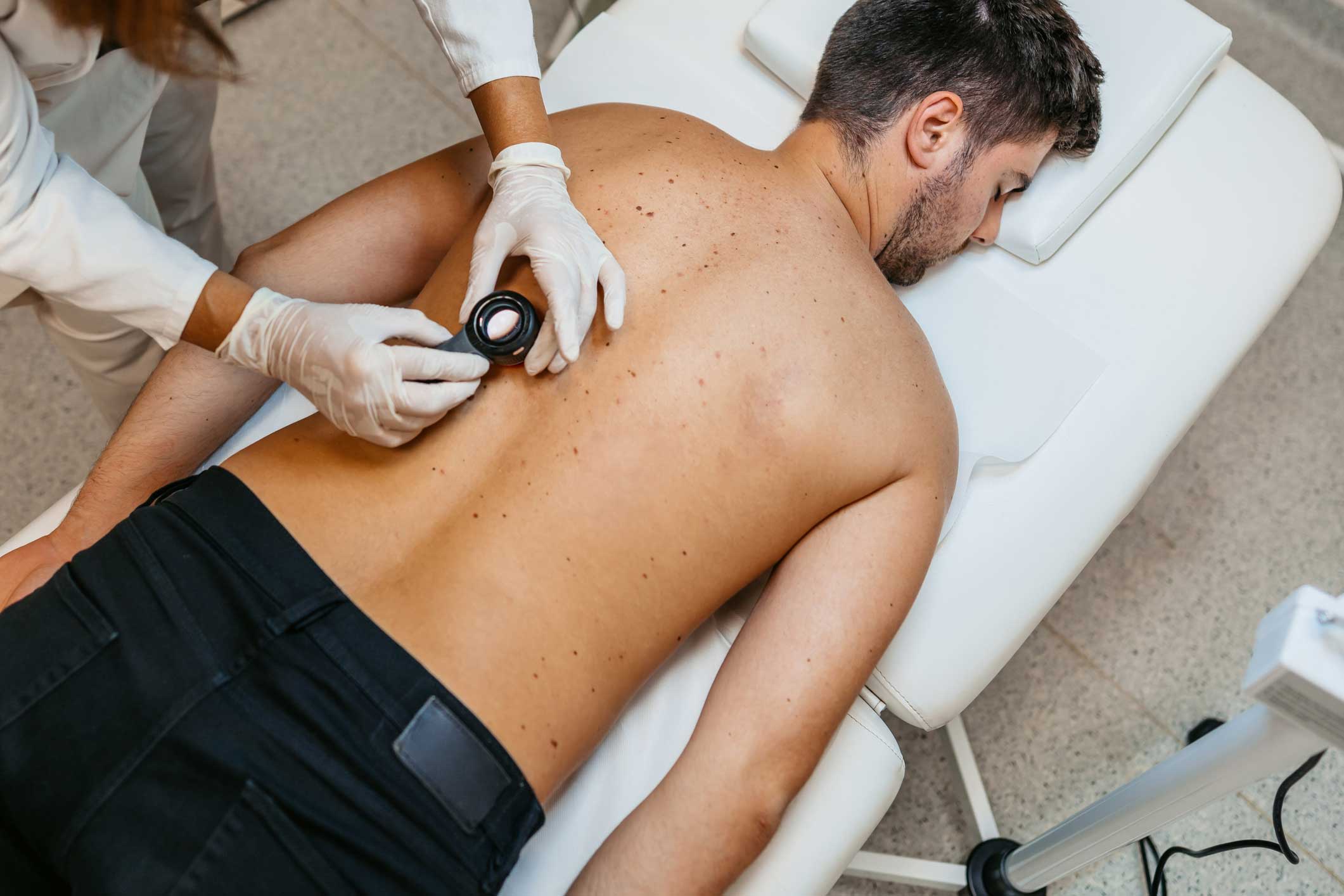 Male receiving skin check assessment